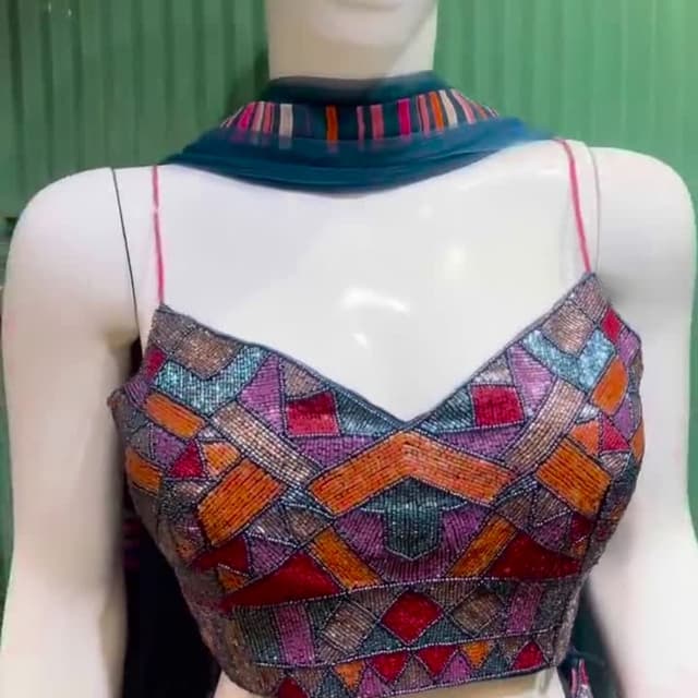 Multicolor, featuring hues of red, orange, purple, teal, and blue Lehenga Choli