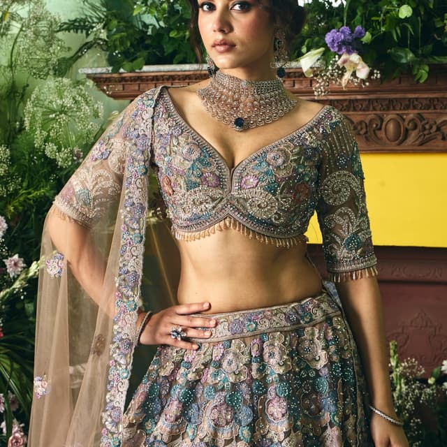 Multicolor with dominant shades of beige, blue, pink, and green Lehenga Choli