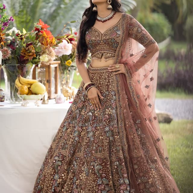 Brown, Gold, Dusty Rose, Teal, and hints of other pastels Lehenga Choli with Dupatta
