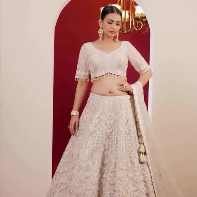 Ivory and subtle pastel accents Lehenga Choli