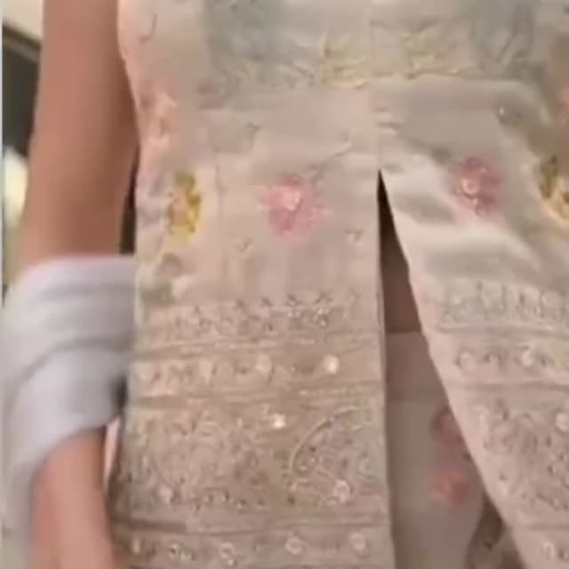 Ivory, pink, and yellow floral with silver accents Jacket/Top