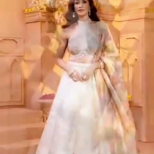 Ivory, gold, and pastel hues Lehenga Choli