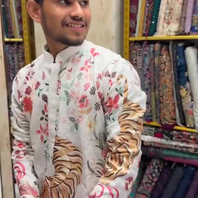 White with a mix of pink, peach, brown, and green Kurta