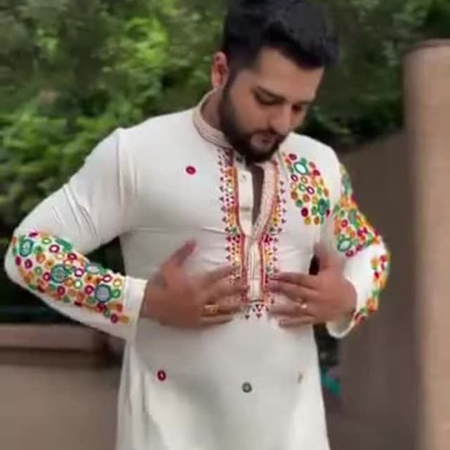 Ivory white with multi-colored embroidery and mirror work Kurta