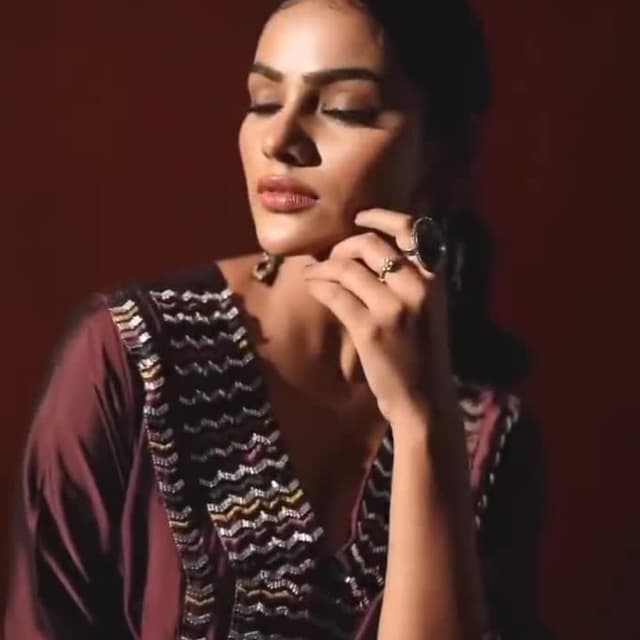 Deep maroon and silver with touches of yellow and other colors in the embellishments Top or Tunic