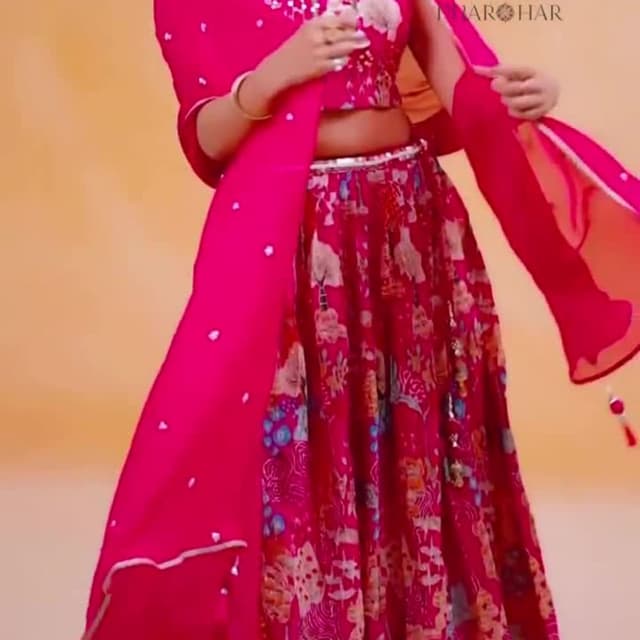 Magenta, with accents of beige, blue, and orange Lehenga Choli