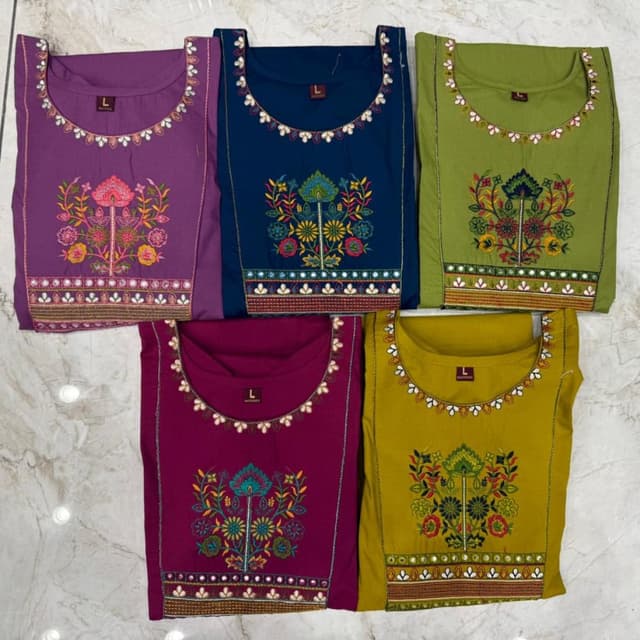 Various, including purple, navy blue, olive green, and mustard yellow. Kurti