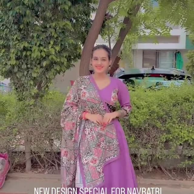 Purple, pink, black, and white Lehenga Choli