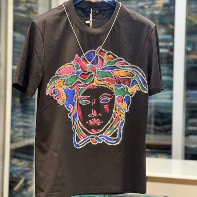 Black, with a vibrant Medusa head design featuring red, pink, blue, green, and orange T-shirt