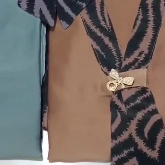 Brown, Black, Gray, and light blue Dress or Top