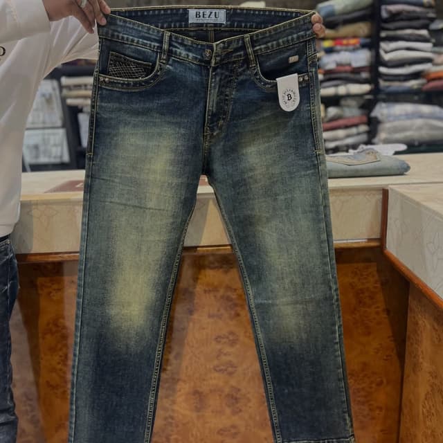 Blue, with faded and distressed accents Jeans