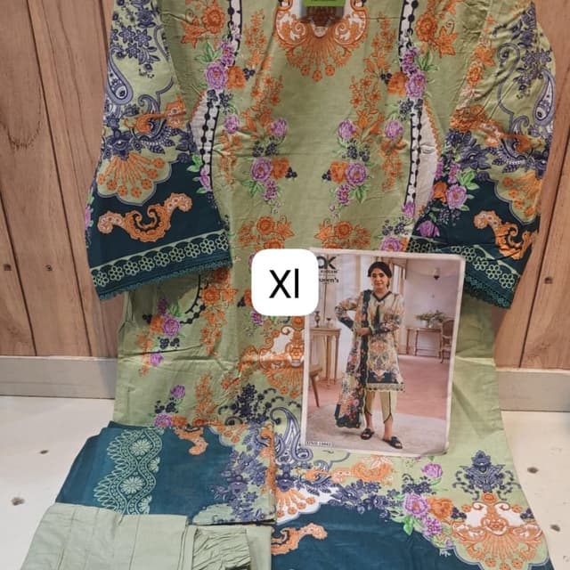 Sage green, teal, orange, purple, and white Unstitched suit