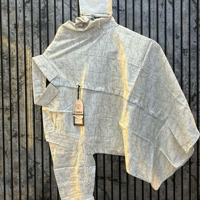 Off-white with a subtle geometric pattern Shirt