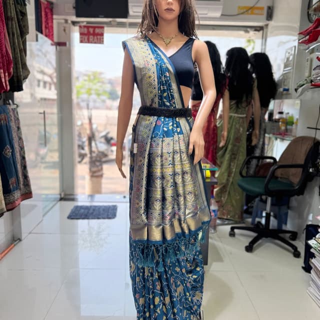 Blue, Gold, and hints of other colors Saree