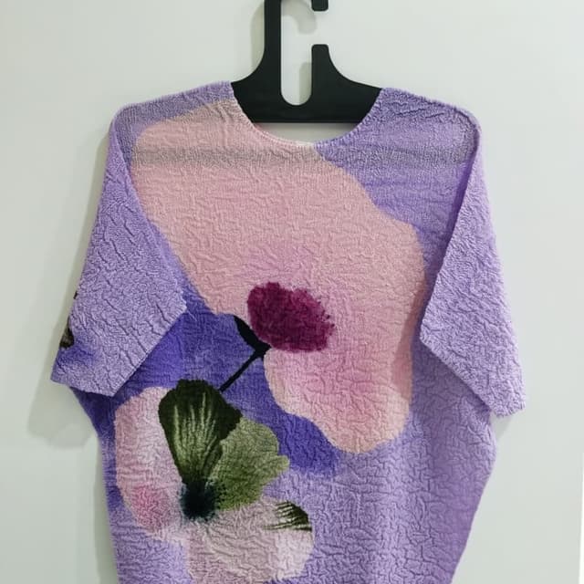 Various shades of purple, pink, green, and black. Top