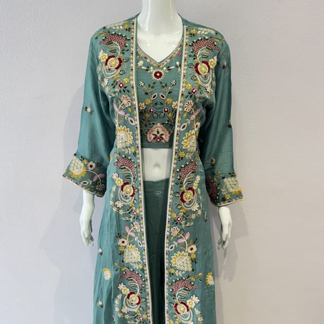 Teal, with multicolor floral embroidery including red, yellow, pink, and white Three-piece suit (Crop top, Pants, and Long Jacket)