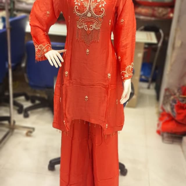 Red with gold and off-white accents Kurta and Palazzo Set