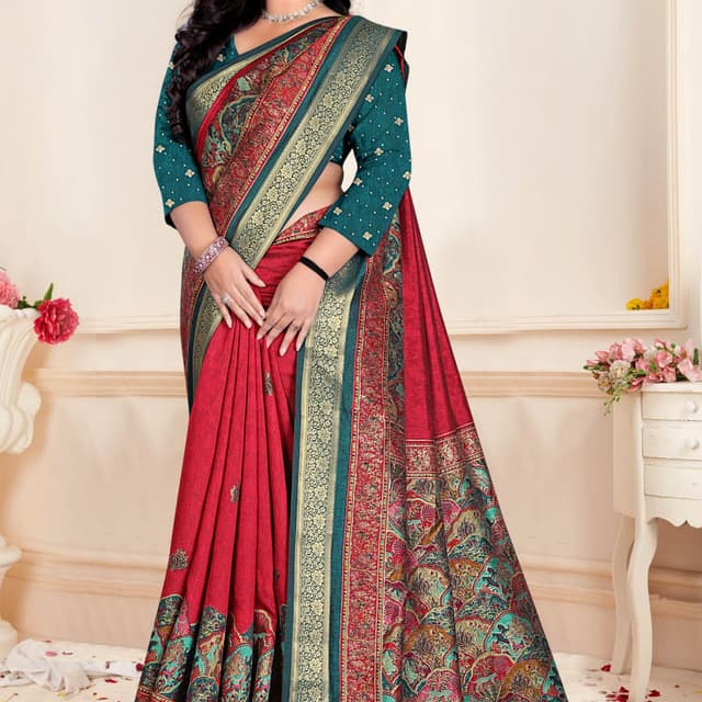 Red, Teal, Gold, and touches of other colors in the pattern. Saree
