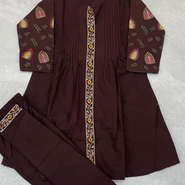 Dark Brown, with accents of white, yellow, and pink Kurta with matching trousers