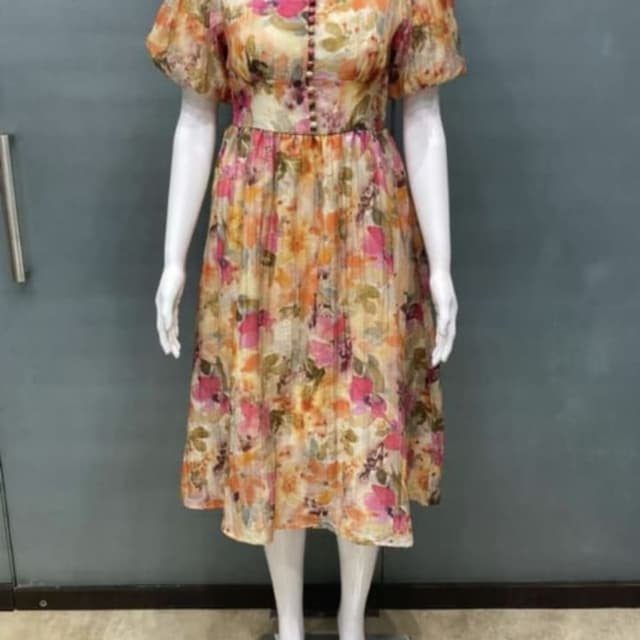 Multicolor, featuring a blend of warm tones like orange, yellow, and pink with hints of green Dress