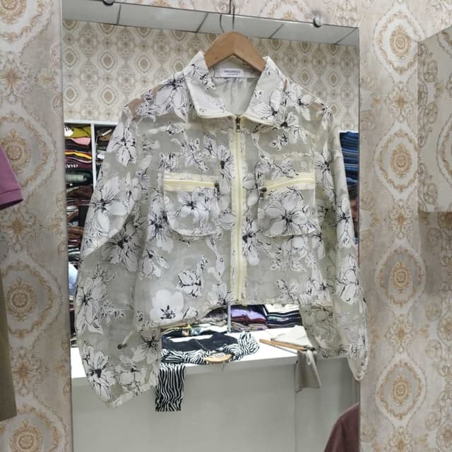 White, Black, and Pale Yellow Jacket
