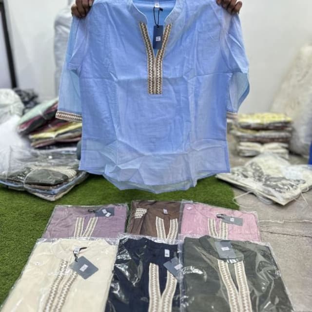 Various pastel colors including light blue, off-white, lavender, brown, pink, navy, and olive green. Shirt