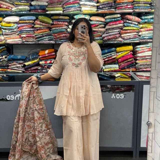 Pale peach and multi-colored embroidery Kurta Set