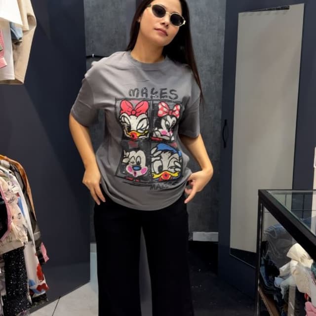 Gray, black, with accents of red, pink, yellow, blue, and white T-shirt