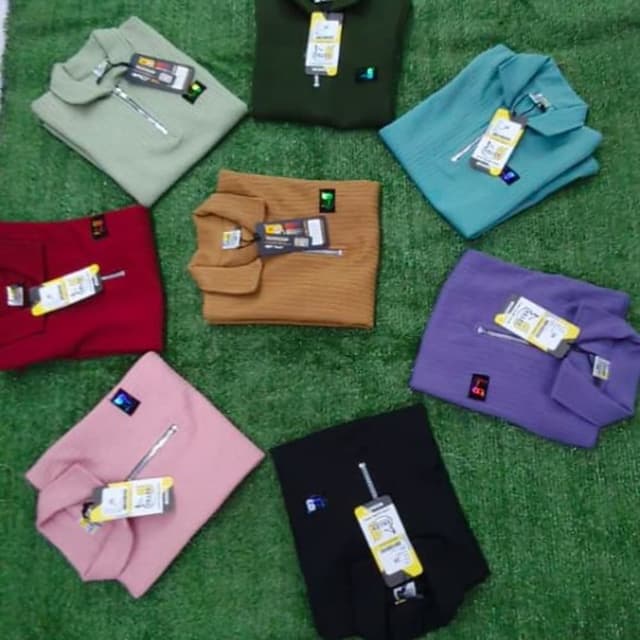 Various - Including shades of green, red, brown, pink, black, purple, and blue. Polo Shirt