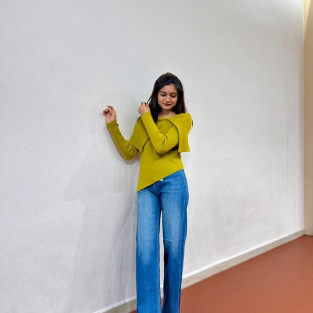 Green and Blue Sweater and Jeans