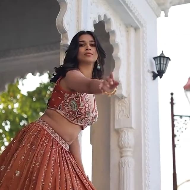 Warm, earthy tones with pops of green and other colors Lehenga Choli