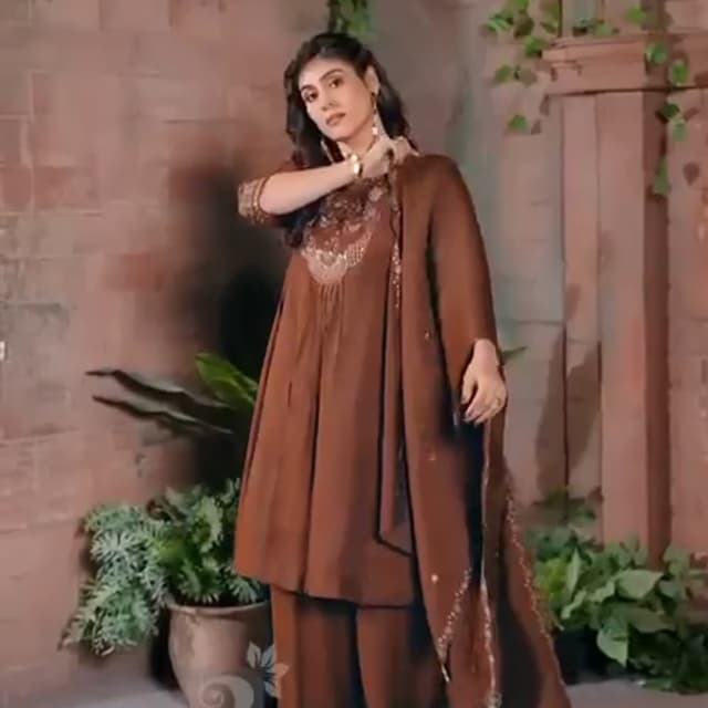 Yellow and White Clothing Brand Logo