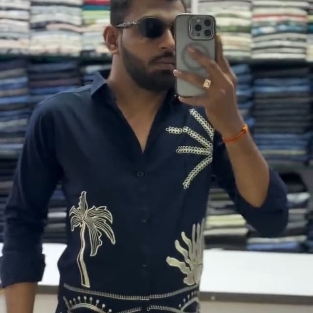 Navy blue with off-white/cream embellishments Shirt