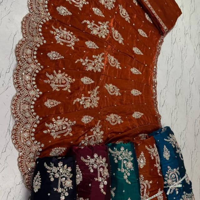 Rust, with silver and other colors variations Lehenga