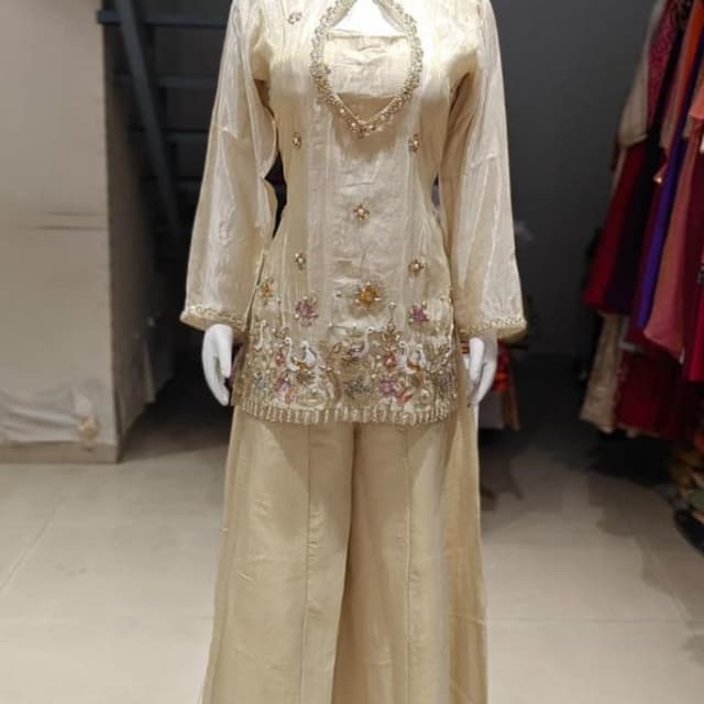 Ivory and Pastel hues Salwar Kameez