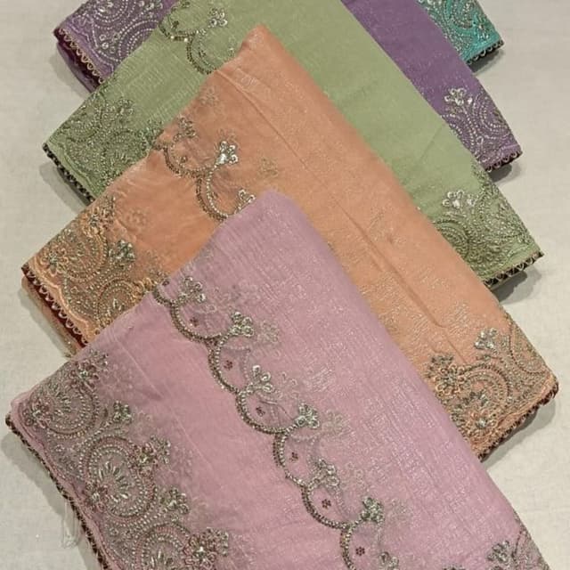 Various pastel shades including pink, peach, green, purple, and teal. Saree