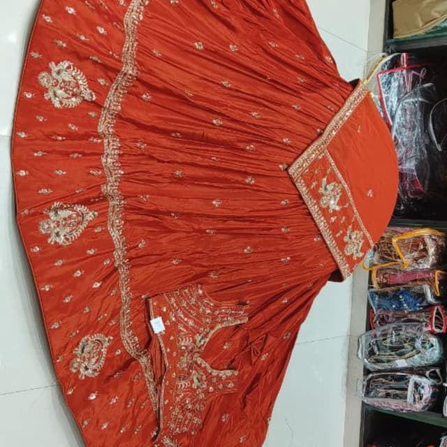 Orange and Gold Lehenga Choli
