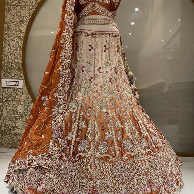 Rust, Peach, Silver, and accents of Pink and Purple Lehenga Choli