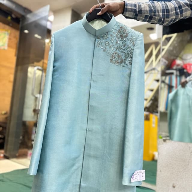 Light Blue, Silver, and muted tones of brown/beige Jacket