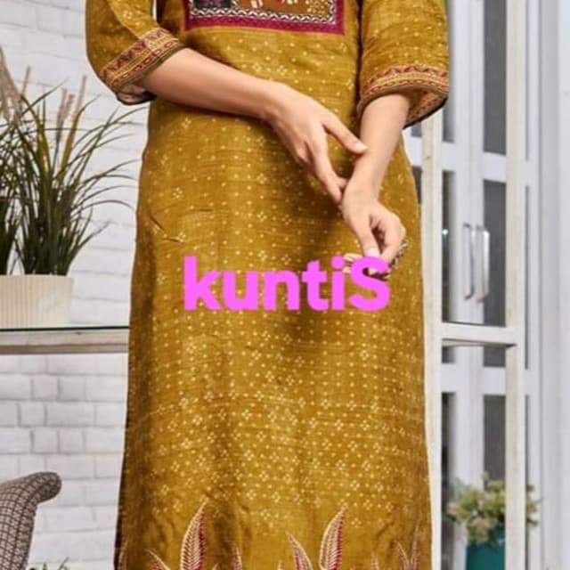 Mustard yellow, pink, brown, red, and hints of black and white Kurti