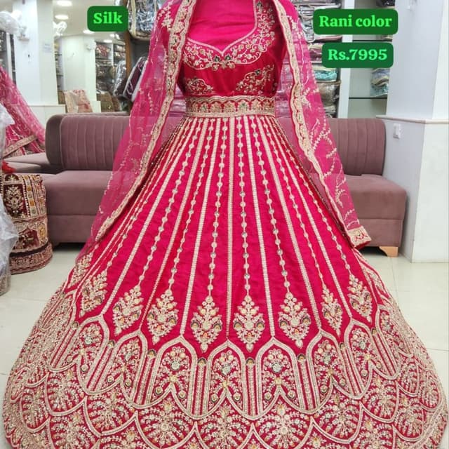 Rani Pink with Gold Lehenga Choli