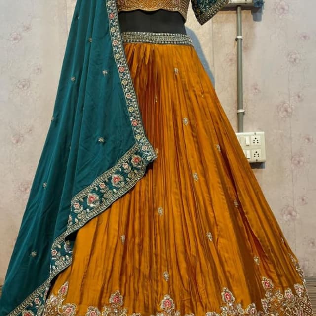 Mustard Yellow, Teal Green, and accents of Pink and Gold Lehenga Choli