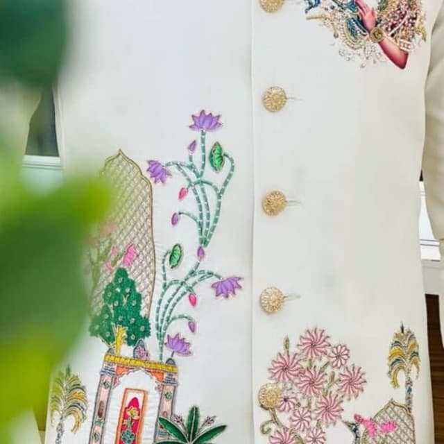 Ivory, gold, with accents of blue, pink, green, and purple Jacket