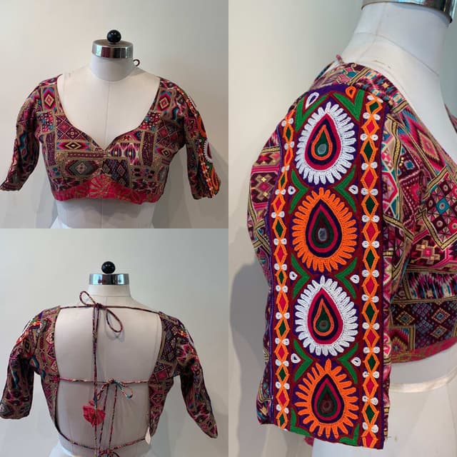 Multicolor, primarily featuring maroon, pink, purple, orange, green, and white Blouse