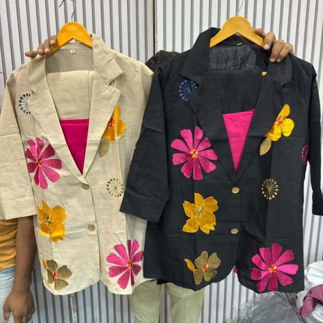 Beige and Black with accents of pink, yellow, and green. Jacket