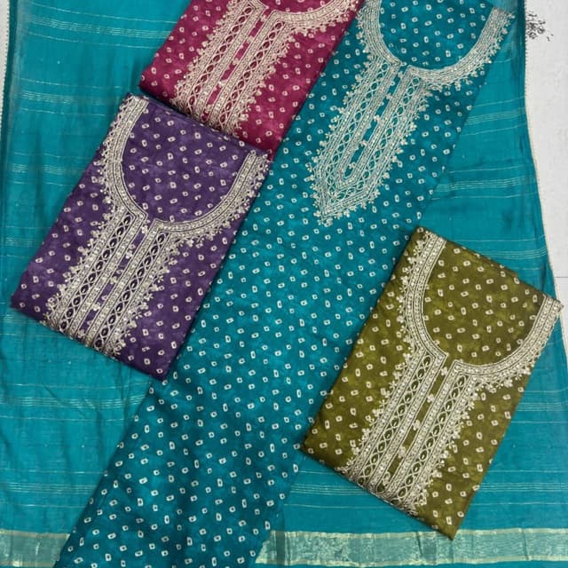 Various - Including shades of Purple, Teal, Olive Green, and Magenta with white accents and silver/gold embroidery. Unstitched Suit Set