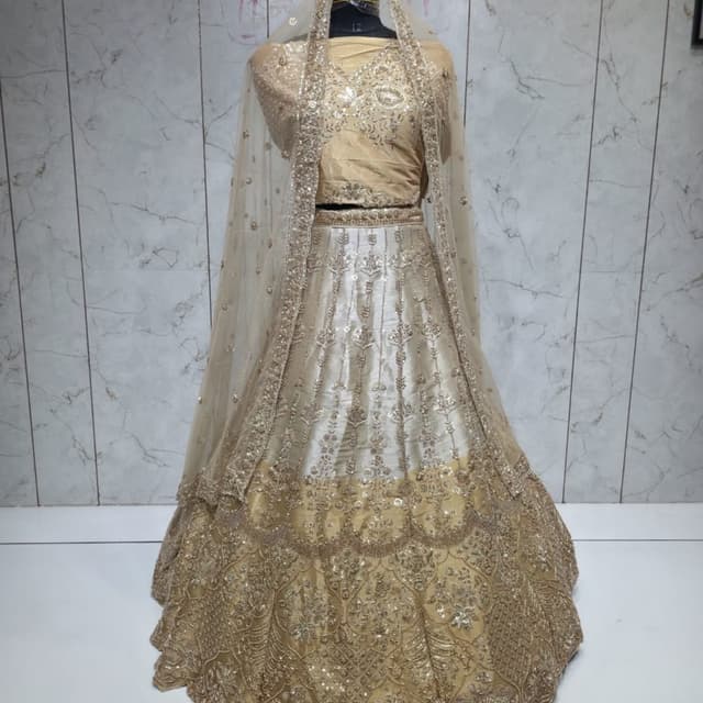Gold and Off-White Lehenga Choli