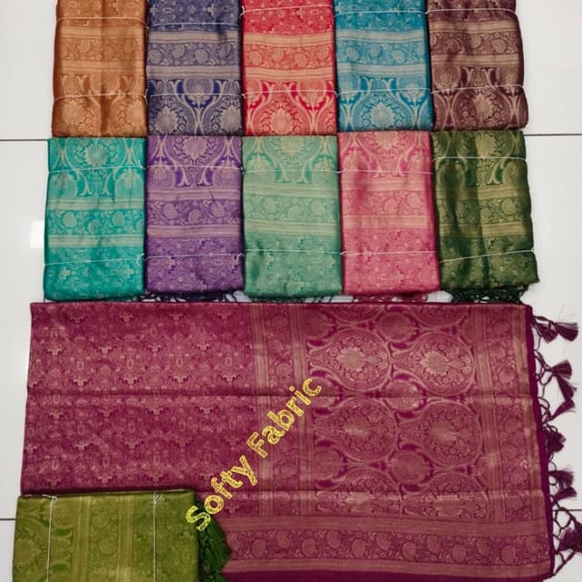 Various shades including burgundy, gold, teal, purple, red, pink, green, and blue Saree