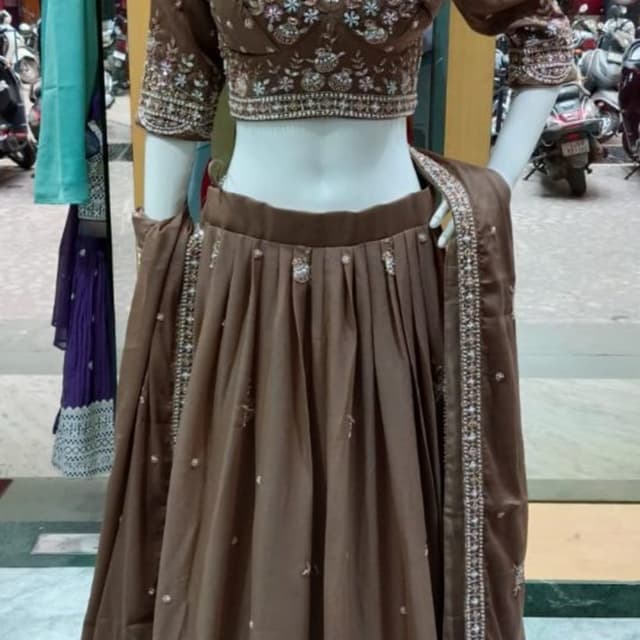 Brown, Beige, and hints of light colors Lehenga Choli with Dupatta