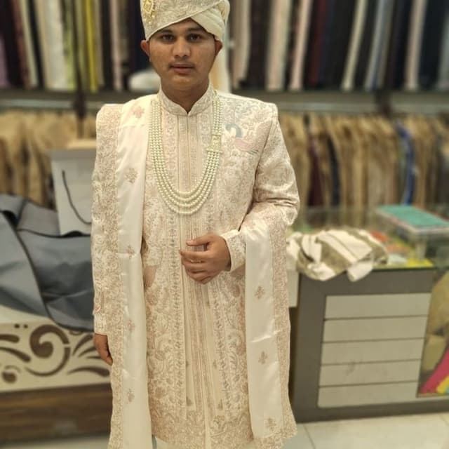 Ivory and gold Sherwani
